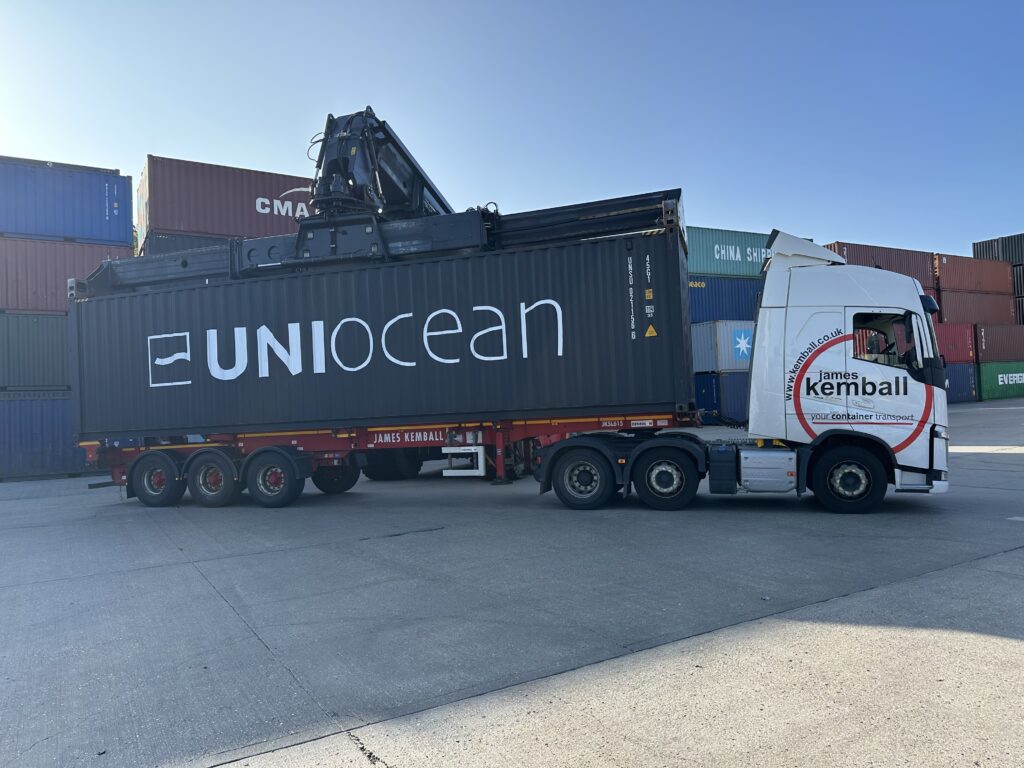 Uniocean shipping container with James Kemball truck